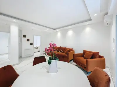 a collage of two pictures of a living room at Executive 2BR Apartment near Croisette Ideal for MIPIM Terrace & Wi-Fi in Cannes