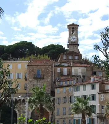 a building with a clock tower on top of it at Cannes One Bedroom Apartment - 85M in Cannes