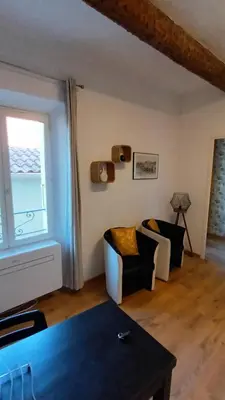 a bedroom with a large bed and a window at Ideal for MIPIM Compact Executive Apartment Walk to Palais Suquet in Cannes
