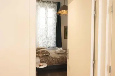 a bedroom with a bed and a window at T2 Cozy Cannes 4 people Near Suquet in Cannes