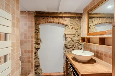 a kitchen with chairs and a table in it at Le Borsalino Loft avec Tropezienne Suquet Cannes in Cannes