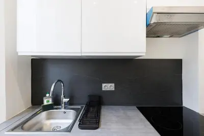 a kitchen with a sink and a microwave at Immogroom - 1Bedroom - CityCenter - AC in Cannes