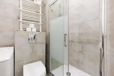a bathroom with a shower and a toilet at Immogroom - 1Bedroom - CityCenter - AC in Cannes