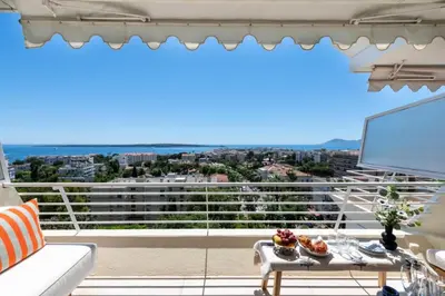 a balcony with a view of a city at Résidence 3p Terrasse Vue Mer – Résidence De Standing - 3P Terrasse Vue Mer – Résidence de Standing MAE-3293 in Cannes