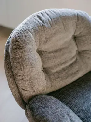 a close up of the arm of a couch at Blue Dream in Le Cannet