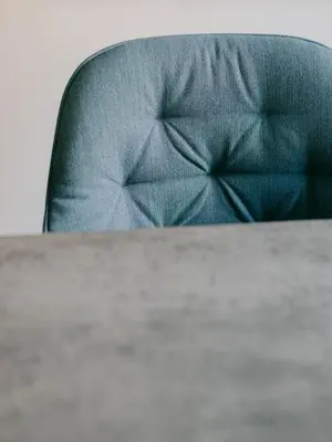 a close up of a table with a blue couch at Blue Dream in Le Cannet