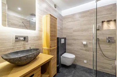 a bathroom with a sink and a toilet at 8 MERLE T2 - Appartement moderner pour 4 personnes proche Palais in Cannes