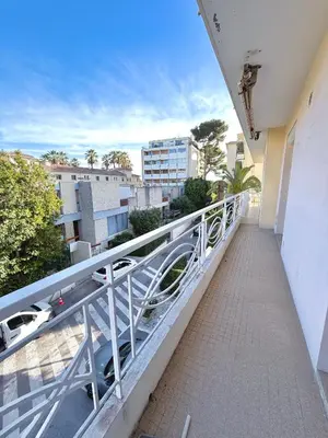 a balcony with a view of a city at VERCORS next to the Sea & Beach in Cannes
