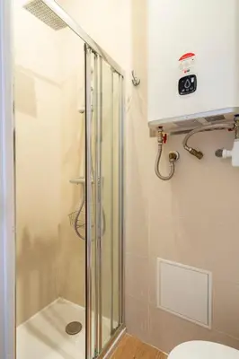 a shower stall in a bathroom with a toilet at TINY HOUSE en duplex avec terrasse in Cannes