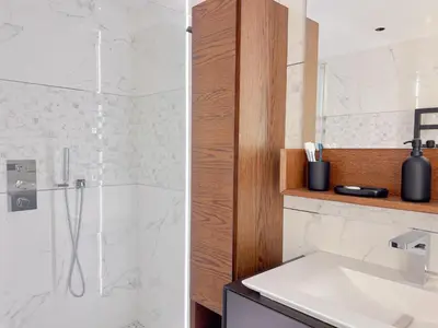 a bathroom with a shower and a sink at Croisette Luxury in Cannes
