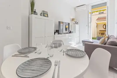 a bathroom with a toilet and a sink and a shower at Le Paradis Hoche - City centre - Terrace - Quiet - AC in Cannes