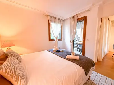 a balcony with a view of a building at Central Cannes Apartment with Private Terrace - 5 Min to Croisette in Cannes