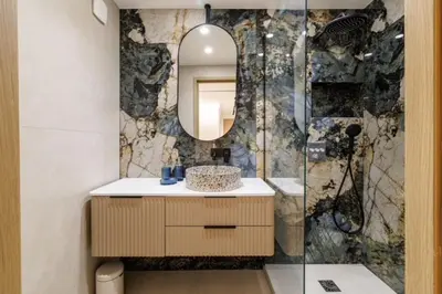 a bathroom with a sink and a mirror at Modern apartment in Cannes 6 people in Cannes