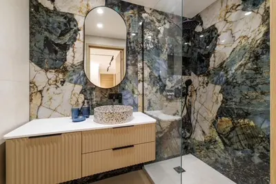 a bathroom with a sink and a mirror at Modern apartment in Cannes 6 people in Cannes