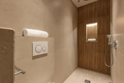 a bathroom with a shower with two towels at Modern 2 Chambres-TERRASSE-POINTE CROISTTE-PALM BEACH A2B267 in Cannes