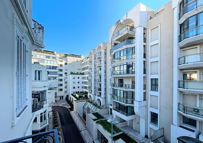 a view of a city with tall buildings at Viva Riviera Cocoon Apartment Cannes Centre in Cannes