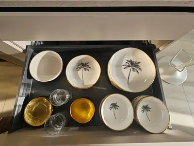 a group of plates with palm trees on them at Superbe Cannes Palm Beach - Luxury renovation - 4 pers in Cannes
