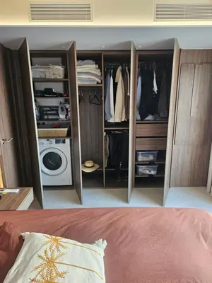 a bedroom with a closet with a washing machine at Superbe Cannes Palm Beach - Luxury renovation - 4 pers in Cannes