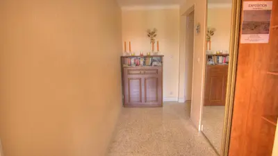 a hallway with a medicine cabinet in a room at Studio 3 étoiles Vue mer 150m Plages Parking Clim WIFI in Cannes