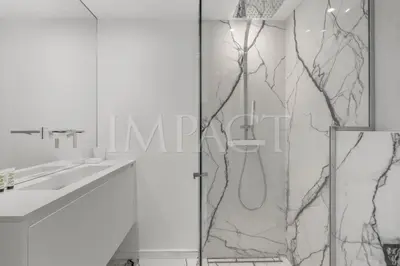 a bathroom with a shower and a sink at REF 2027 - Cannes Centre - Apartment for Rent in Cannes