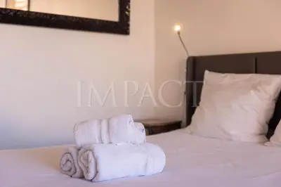a pile of towels sitting on top of a bed at Cannes Croisette 2034 - Studio for rent in Cannes
