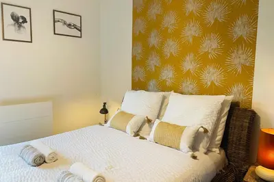 a bedroom with a bed with towels on it at Bright apartment in Cannes for 5 people in Cannes