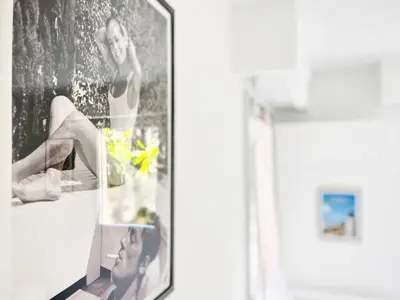 a picture of a woman on a wall in a room at Cannes Estello - Comfortable accommodation Terrace Parking in Cannes