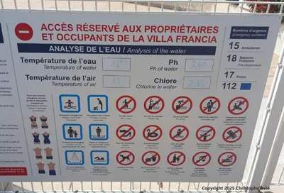 a sign on a fence with various prohibited signs at Cannes superbe appt 3 pces Wi-Fi Clim Piscine Vue sur les îles et les Paquebots in Cannes