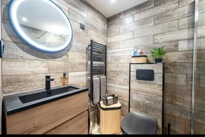 a bathroom with a sink and a mirror at Studio tout confort proche Mer et Croisette in Cannes