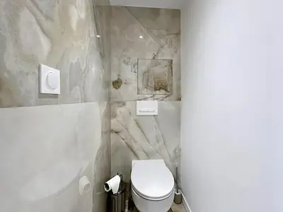 an empty lobby with plants and a ceiling at StudioLuxCannes - Suite premium avec baignoire à Cannes, plage à 2 min et Palais des Festivals in Cannes