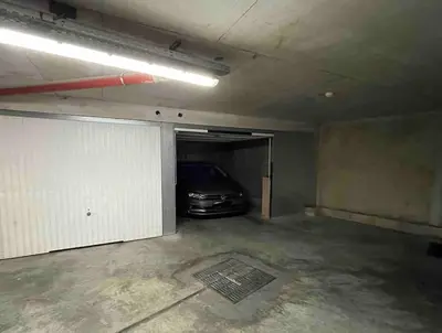 a garage with a car parked in it at Cannes Maria in Cannes