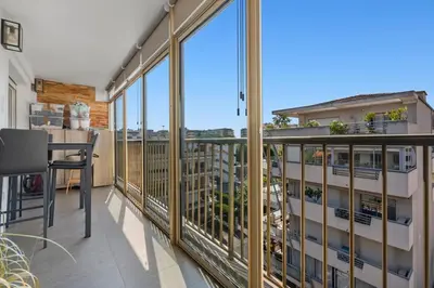 a balcony with a view of a building at 11 MADRID - Splendid one-bedroom apartment near Croisette in Cannes