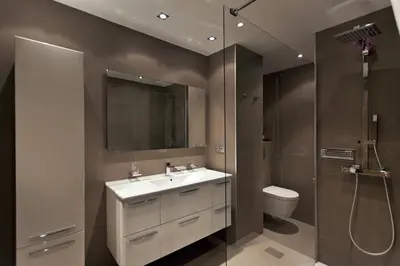 a bathroom with a sink and a shower and a toilet at 2 chambres au cœur de Cannes - Croisette et plages à 1 min in Cannes