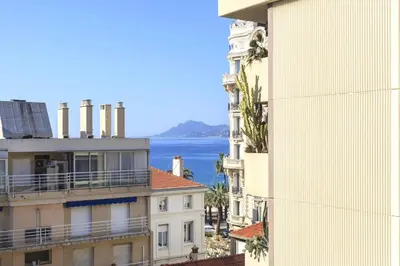 a view of the ocean from a building at 2 chambres au cœur de Cannes - Croisette et plages à 1 min in Cannes