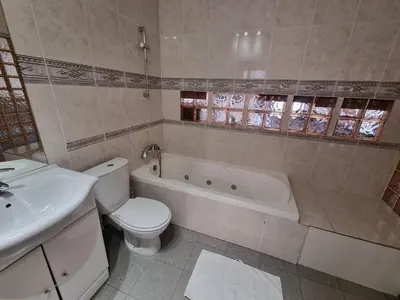 a bathroom with a toilet and a tub and a sink at Charming Studio near Croisette in Cannes