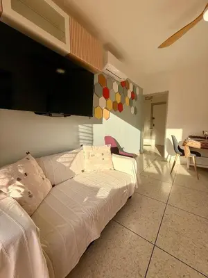 a bedroom with a bed and a flat screen tv at Le Marvel By ApiRent #Climatisation #Central #Balcon in Cannes
