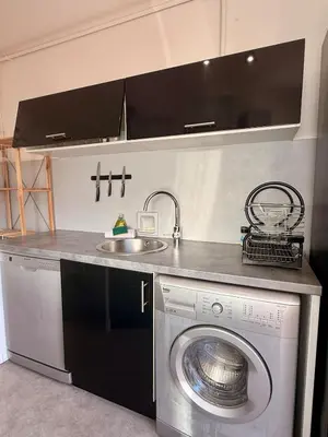 a kitchen with a washing machine and a sink at Le Marvel By ApiRent #Climatisation #Central #Balcon in Cannes