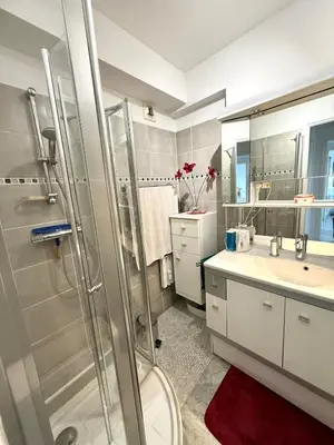 a bathroom with a shower and a toilet and a sink at T2 derrière le Martinez - Croisette in Cannes