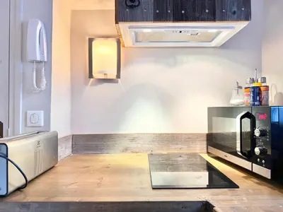a kitchen with a counter top in a room at Elegant studio in Cannes - Le Suquet - 2 people in Cannes