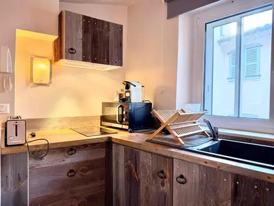 a kitchen with a counter with a microwave and a sink at Elegant studio in Cannes - Le Suquet - 2 people in Cannes