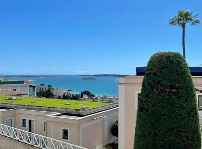 a view of the ocean from a building at Splendid view Apartment in Cannes in Cannes