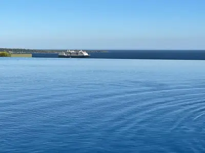a large ship on a large body of water at Splendid view Apartment in Cannes in Cannes