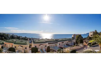 arial view of a building with the ocean in the background at Vue mer piscine parking tennis 4 personnes in Cannes