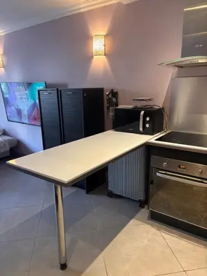a kitchen with a counter top and a stove at Studio Palais Rouaze-50m de la Croisette in Cannes
