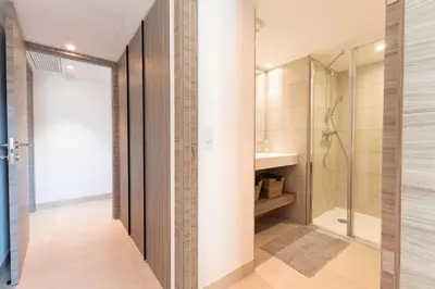 a bathroom with a shower and a sink at Villa Lerins 401 by Halldis in Cannes