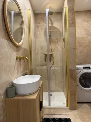 a bathroom with a sink and a shower at Charming studio 2 min from beach in La Celle-sous-Gouzon