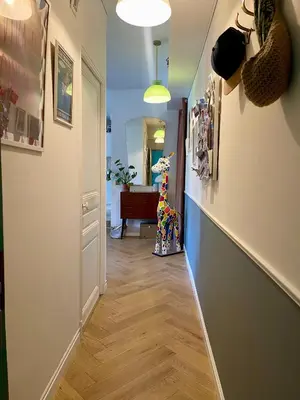 a hallway of a home with at Terrasse des artistes - Appartement 2 pièces avec pergola in Cannes