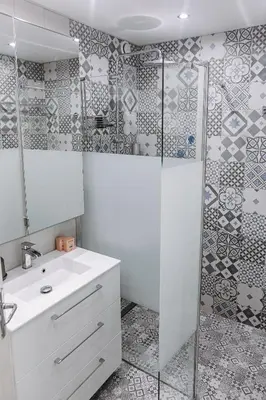 a bathroom with a sink and a shower at Private Garden Hideaway by the Sea in Cannes