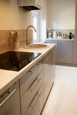 a kitchen with a sink and a counter at Écrin de charme à 2 pas de la Croisette & Palais in Cannes