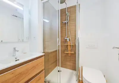 a bathroom with a shower and a sink at Charmant deux pièces au Suquet in Cannes